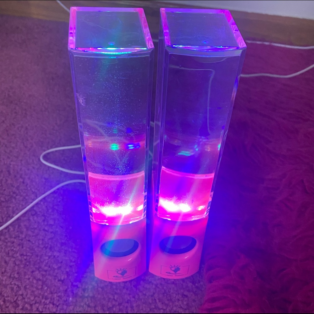 Pink light up water USB speakers.